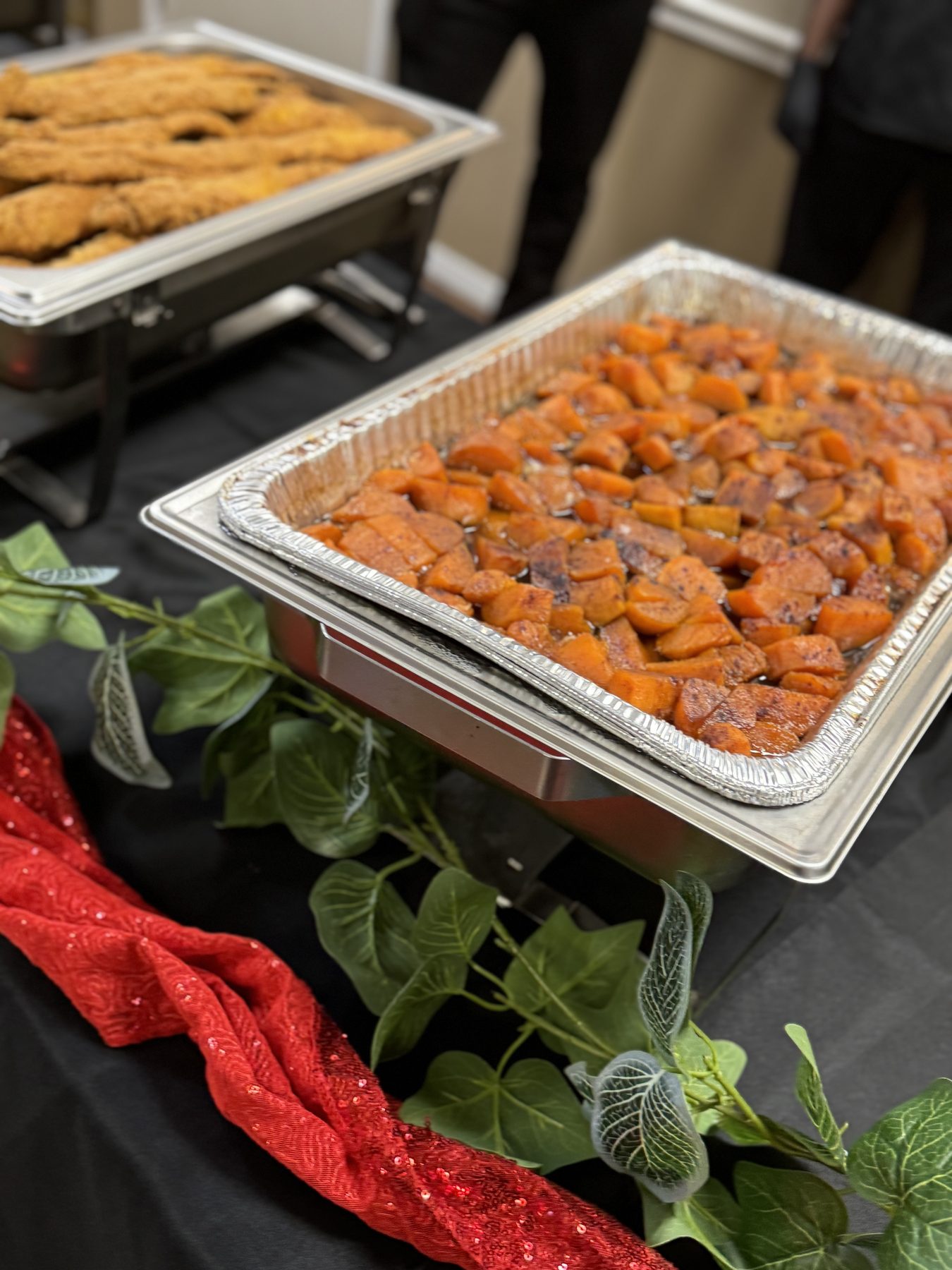 Styled wedding catering spread with red accents